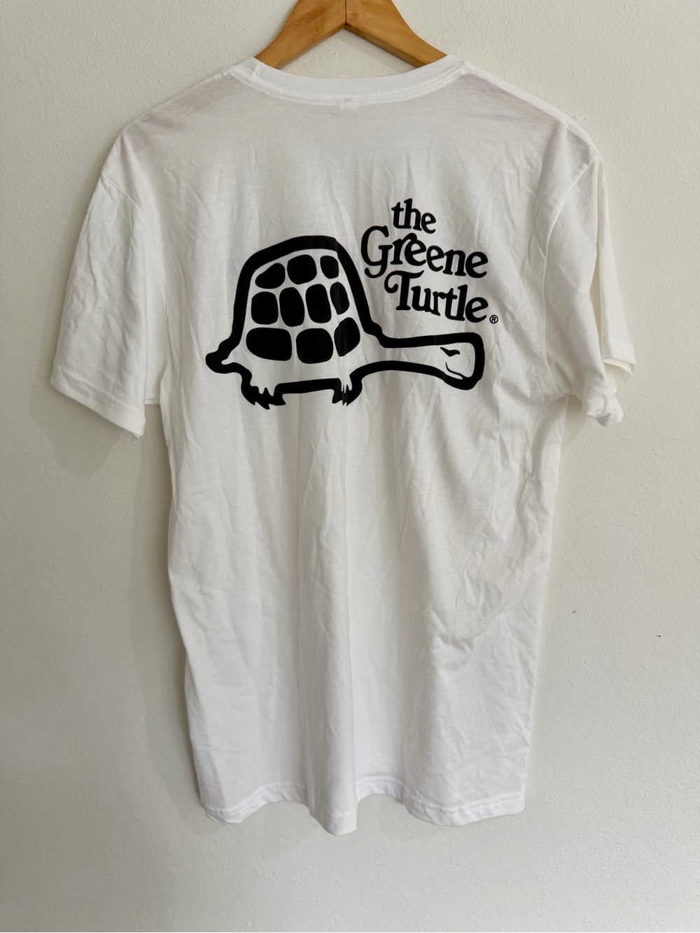 The Green Turtle Apparel White Short-Sleeve Tee with Small Black Turtle Logo